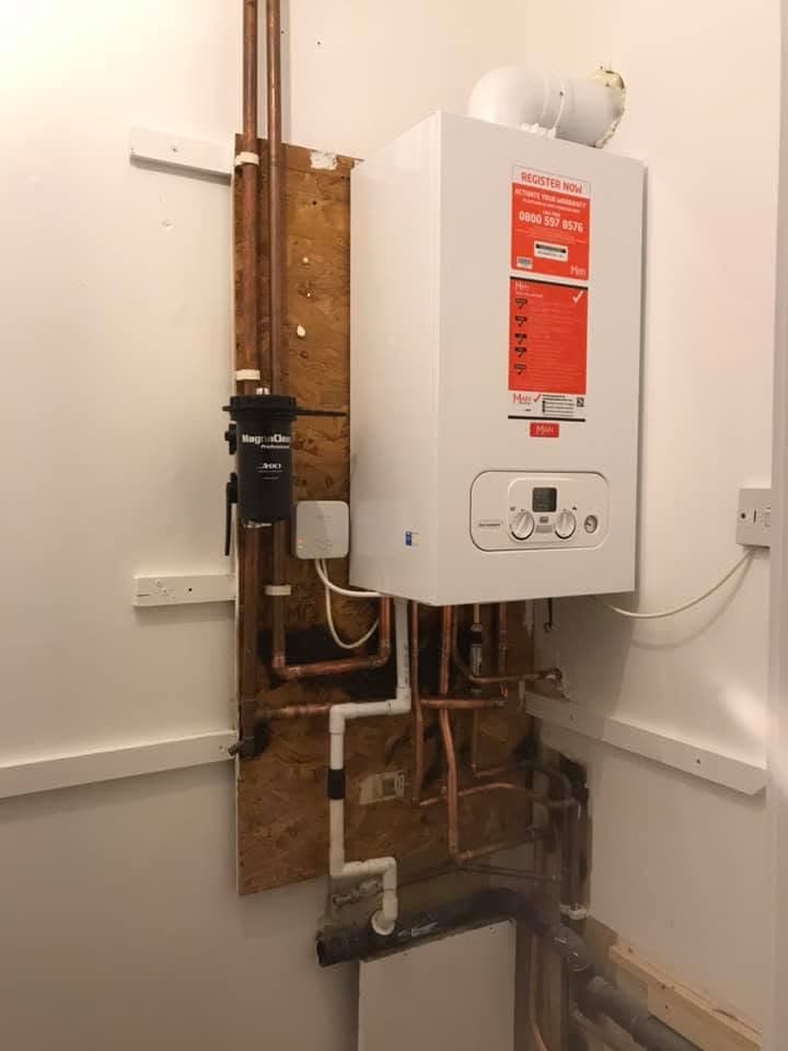 MAIN combi boiler installation with MagnaClean filter, copper pipework and wireless controller